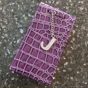 Purple notepad with J initial